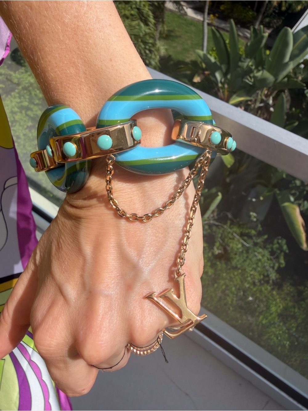 Louis Vuitton Blue and Turquoise Striped Resin Bracelet with Gold LV Charm - Picture 4 of 13